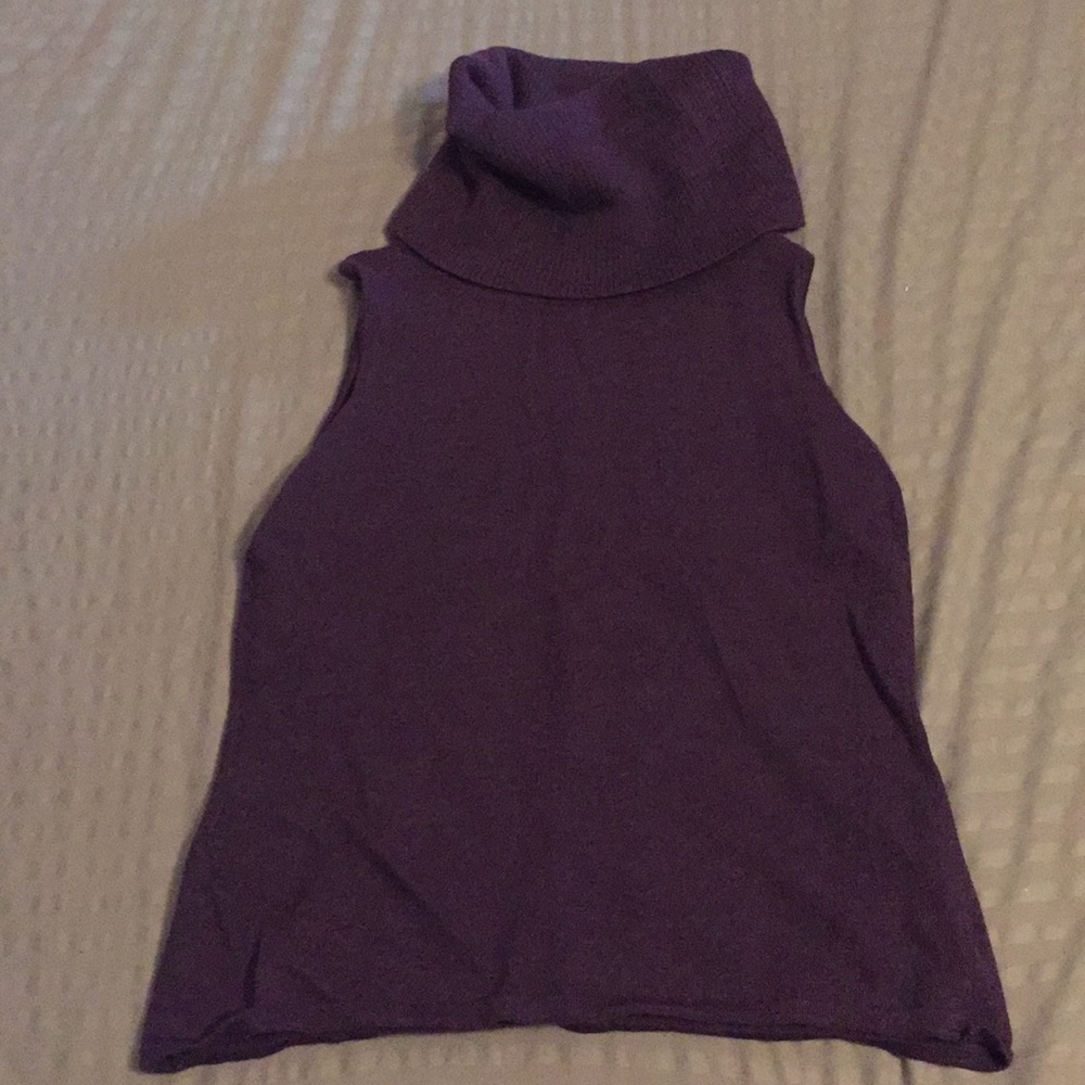 Purple turtle neck. Sleeveless